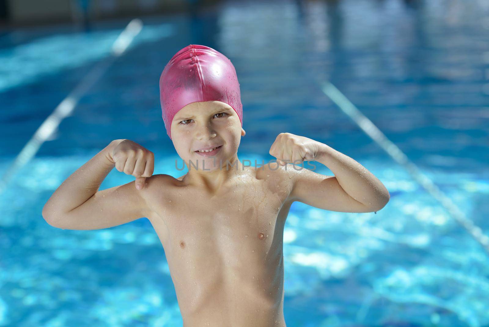 happy child on swimming pool by dotshock