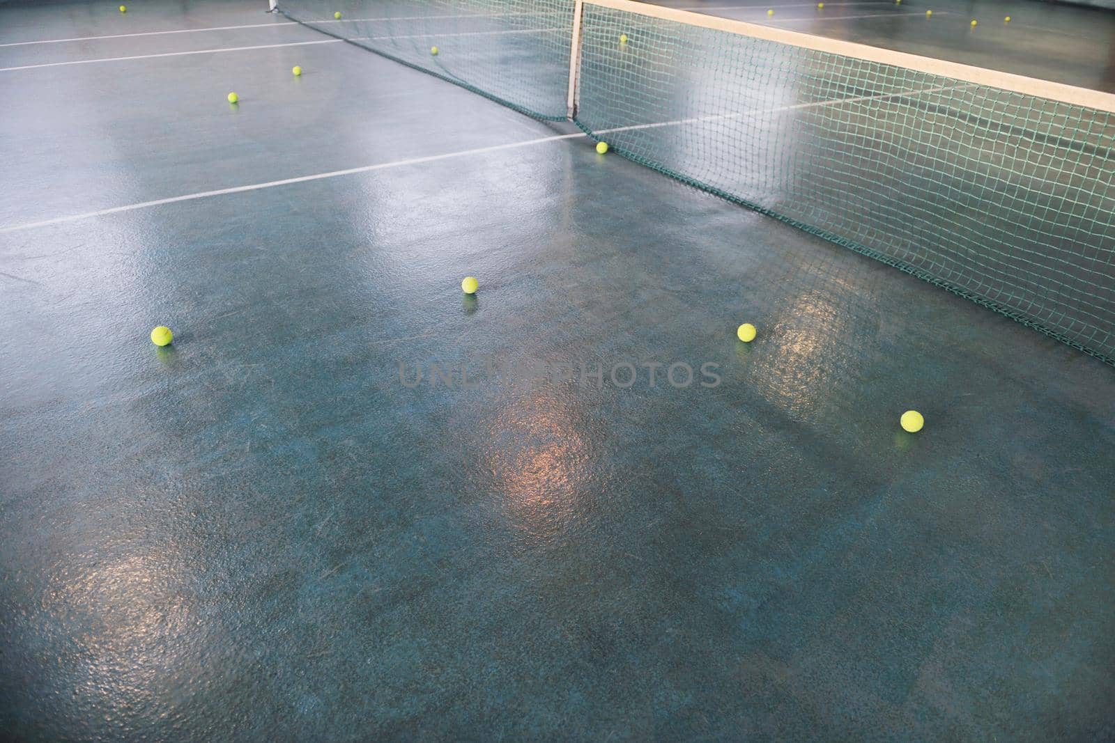 manny tennis bals on indoor sport court 