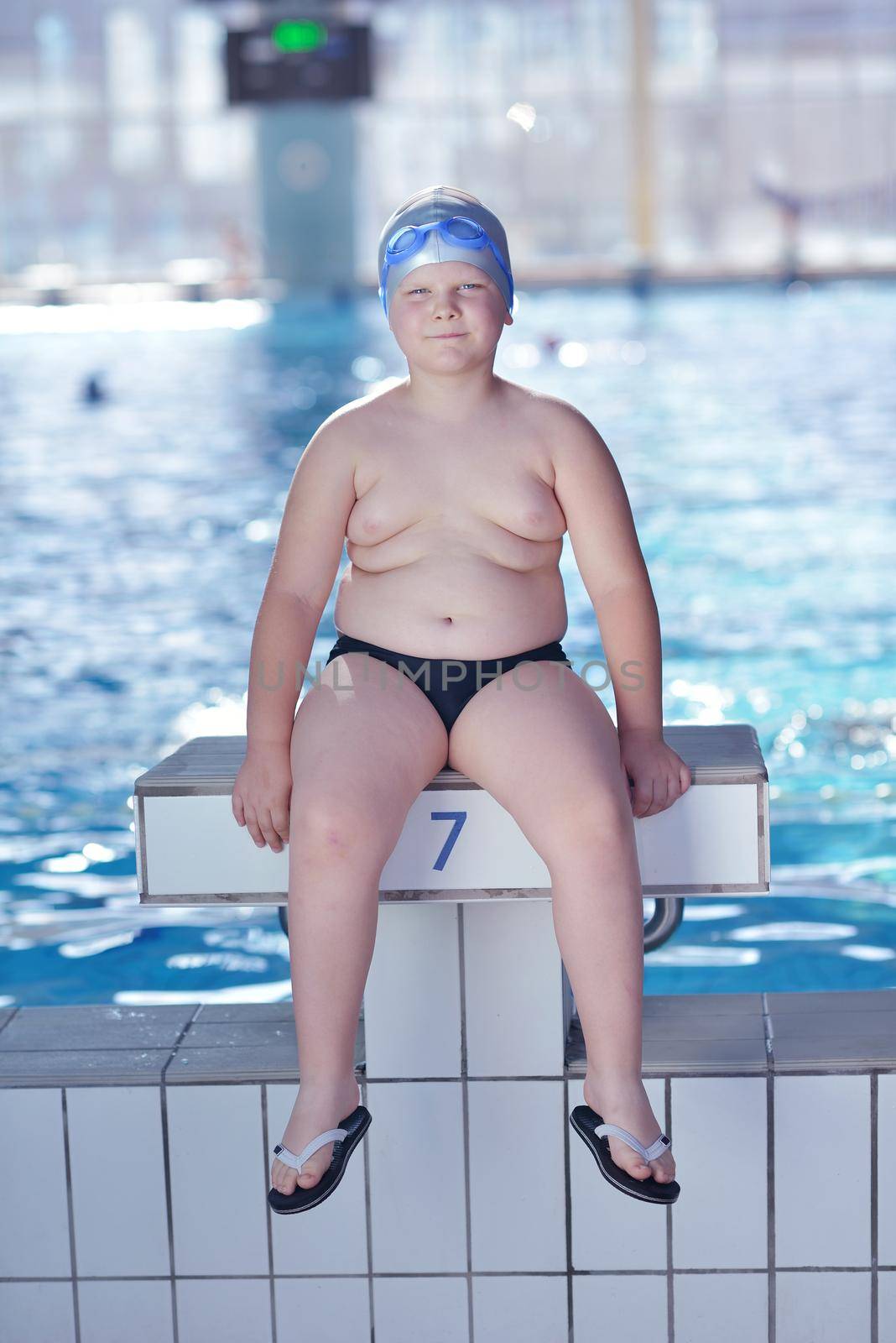 happy child on swimming pool by dotshock