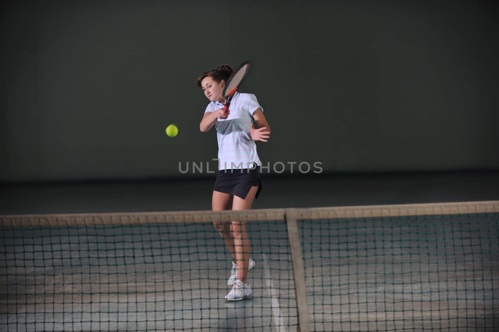 young girl exercise tennis sport indoor