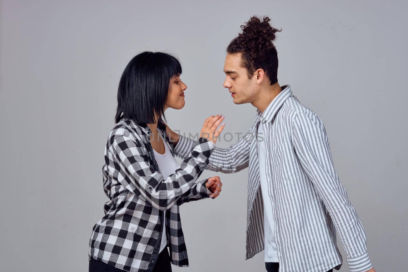 young couple modern clothes posing fun friendship. High quality photo