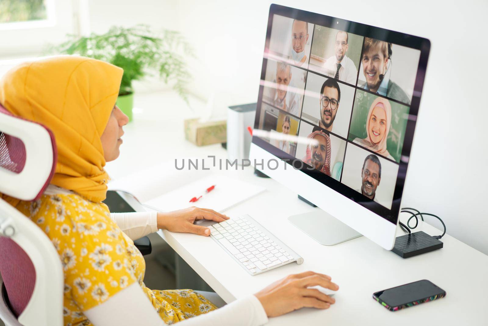 Middle Eastern businesswoman having the online conference