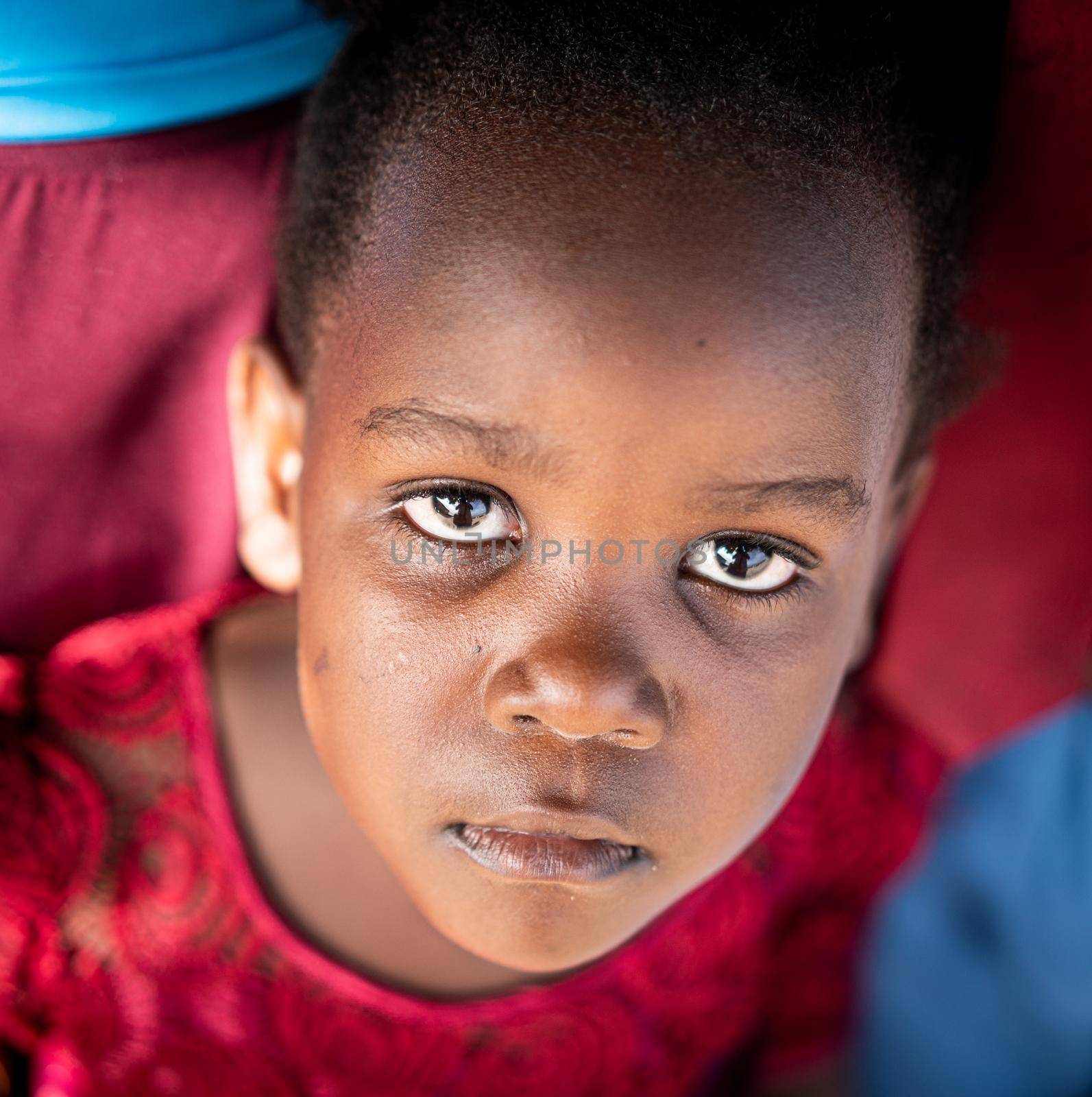 Cute little black African girl close up