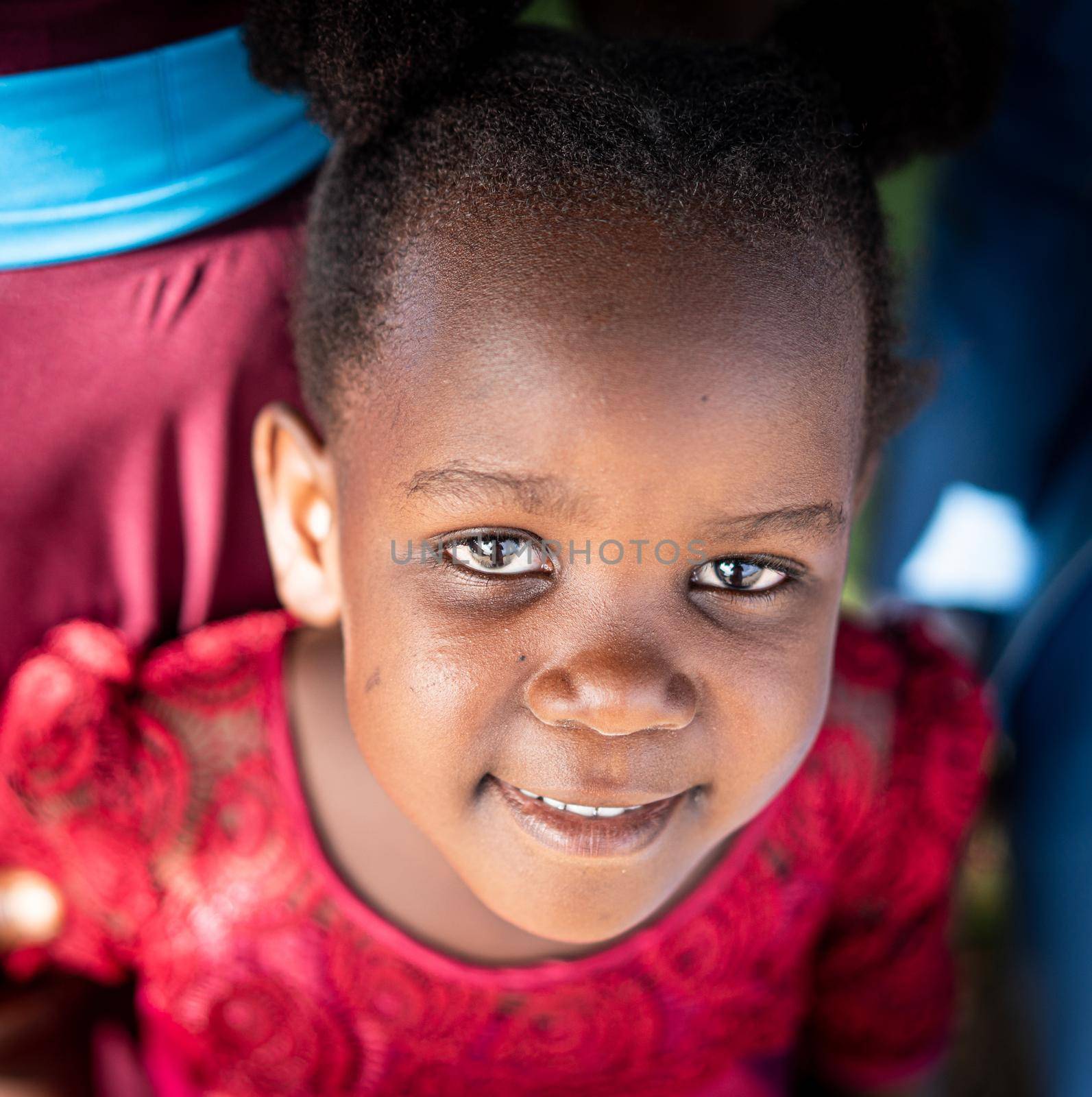 Cute little black African girl close up