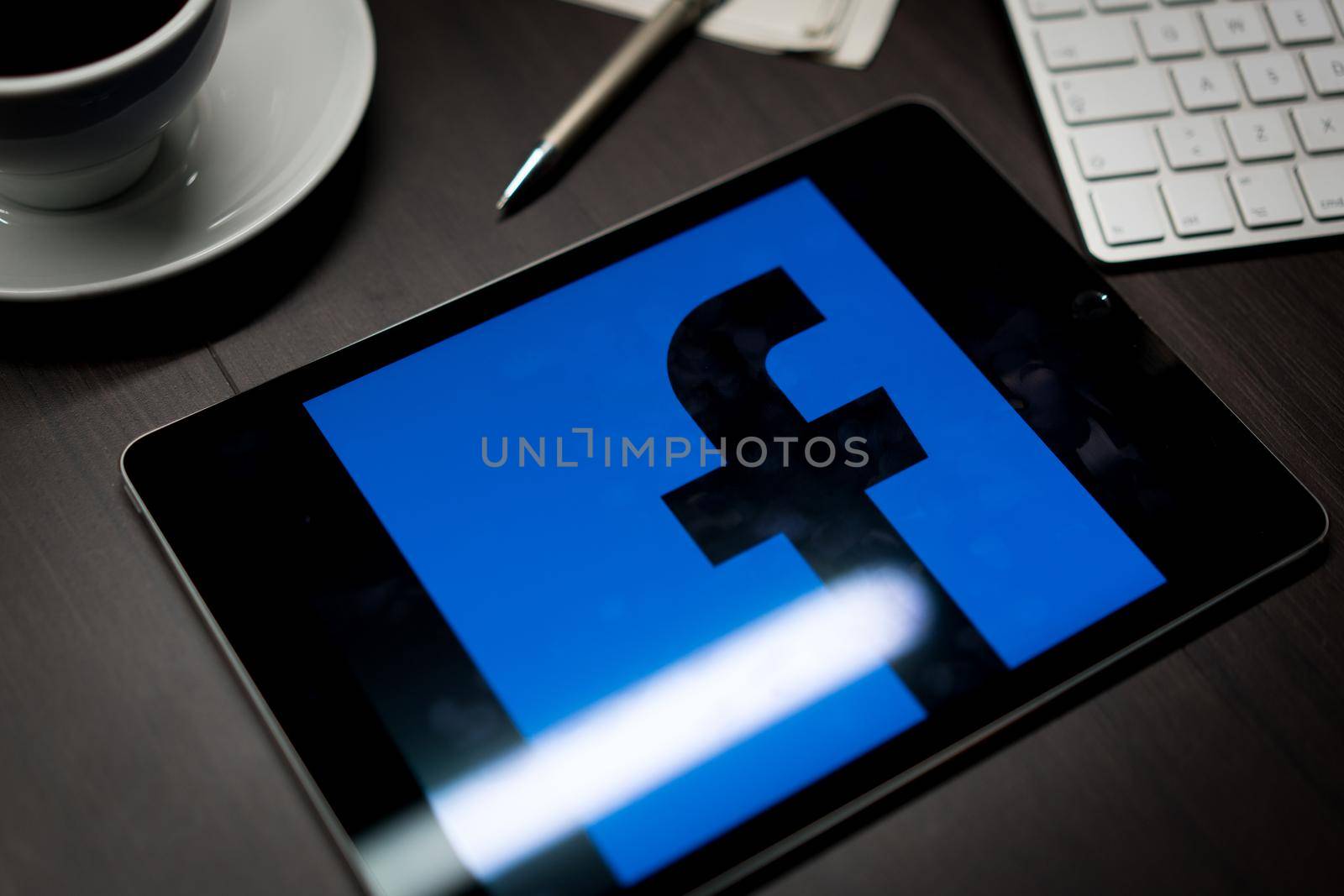 New York, New York / USA - 11 11 2019: Logo of Facebook on the iPad Air2 in on office desk