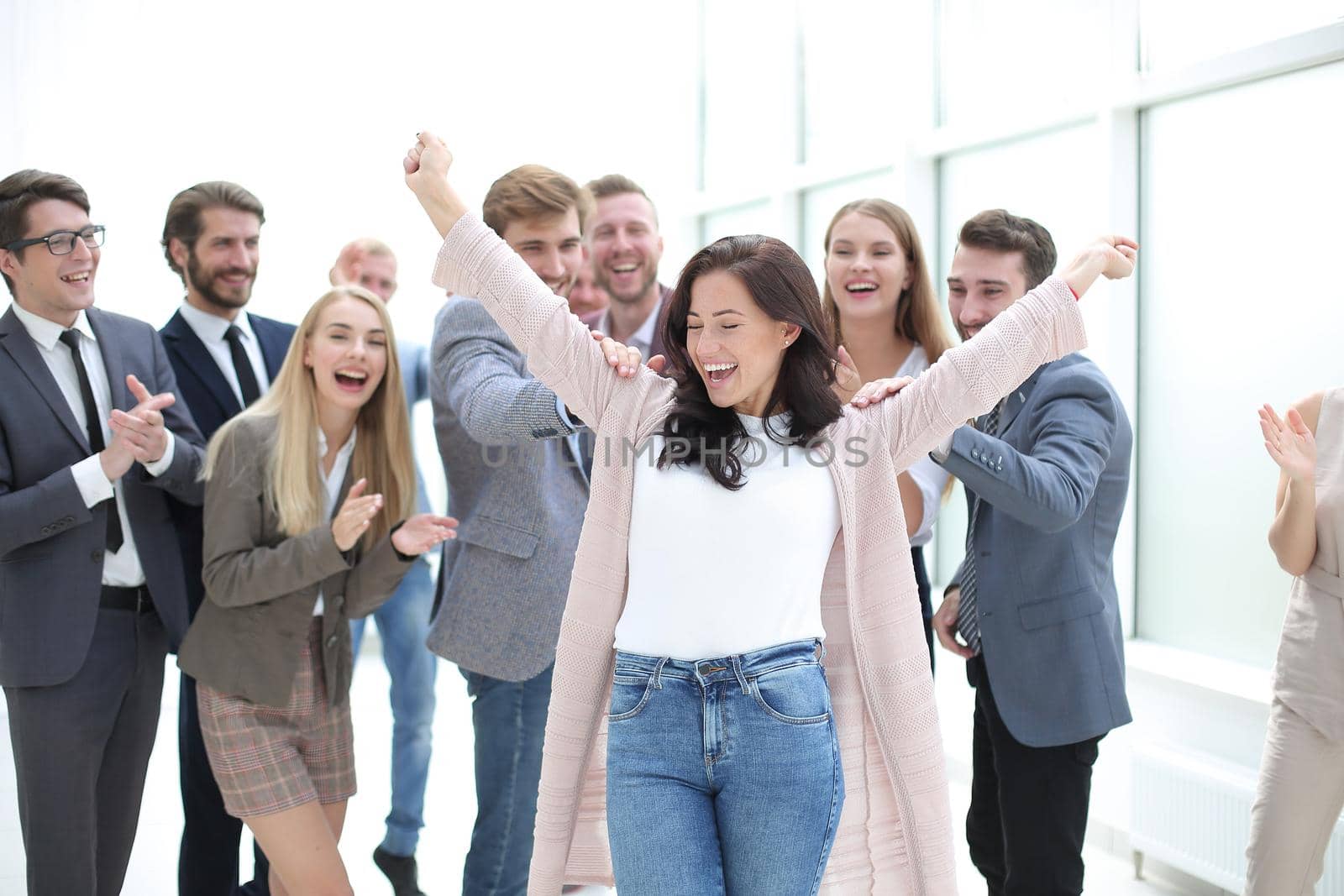 happy woman leader on the background of her business team. success concept