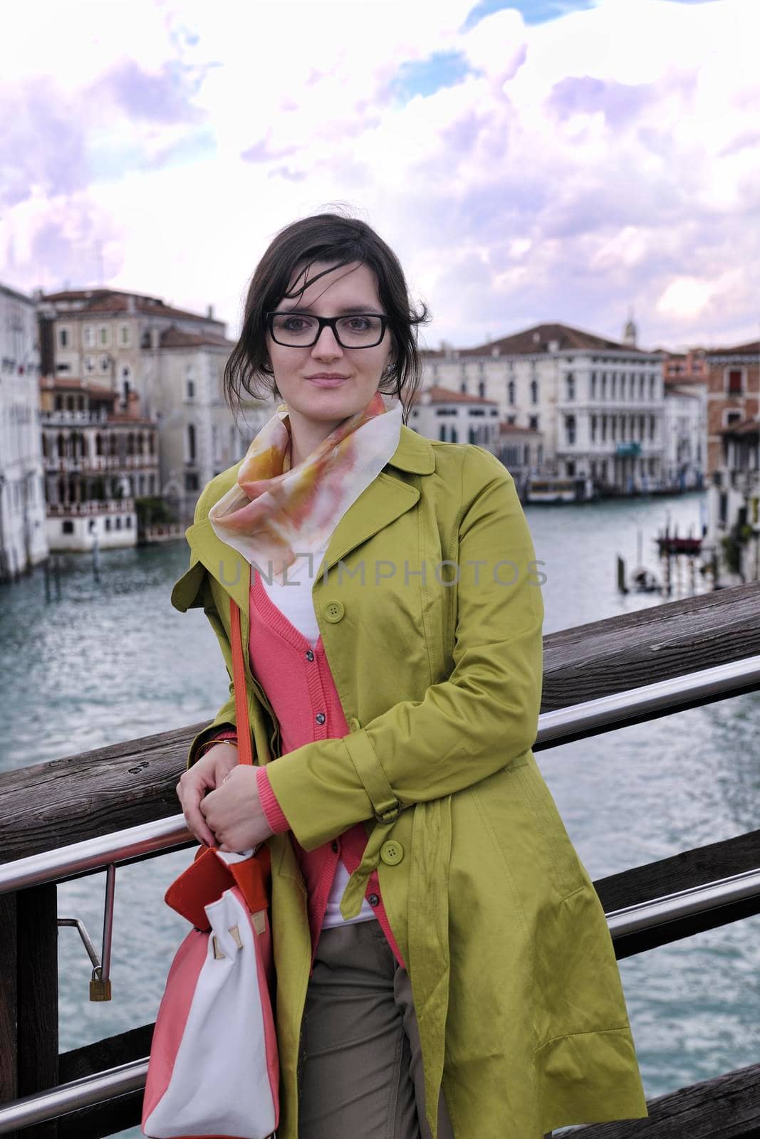 Beautiful tourist woman in Venice, exploring the old city