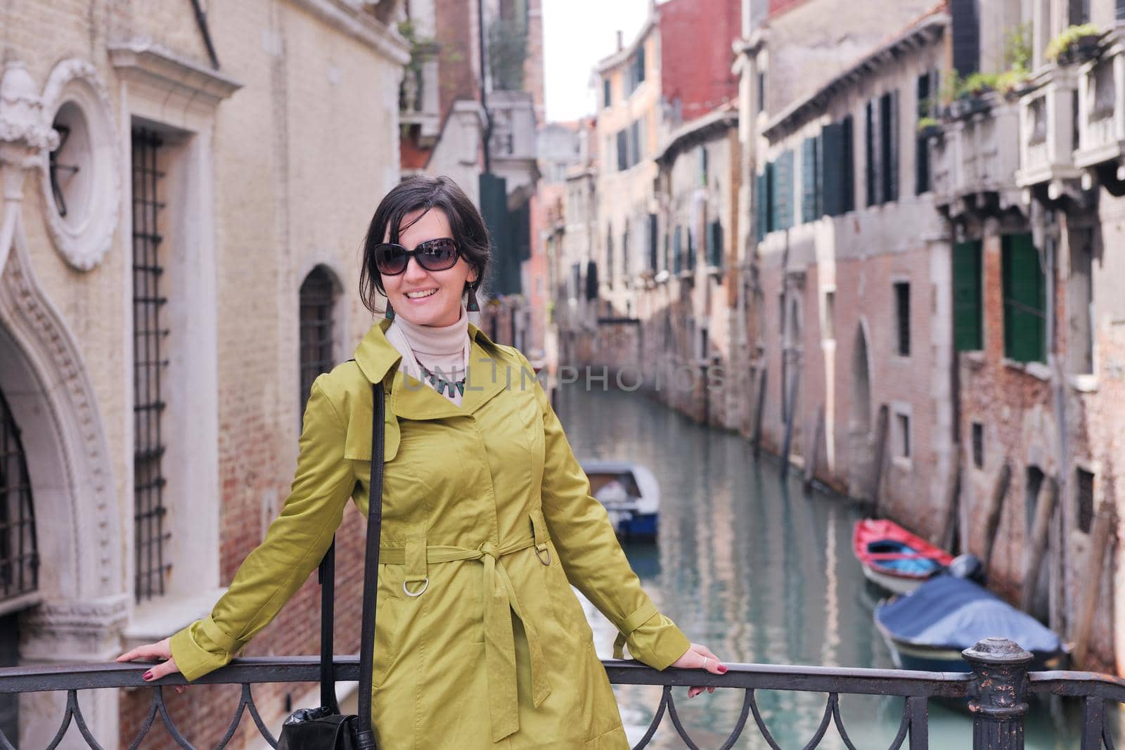 Beautiful tourist woman in Venice, exploring the old city