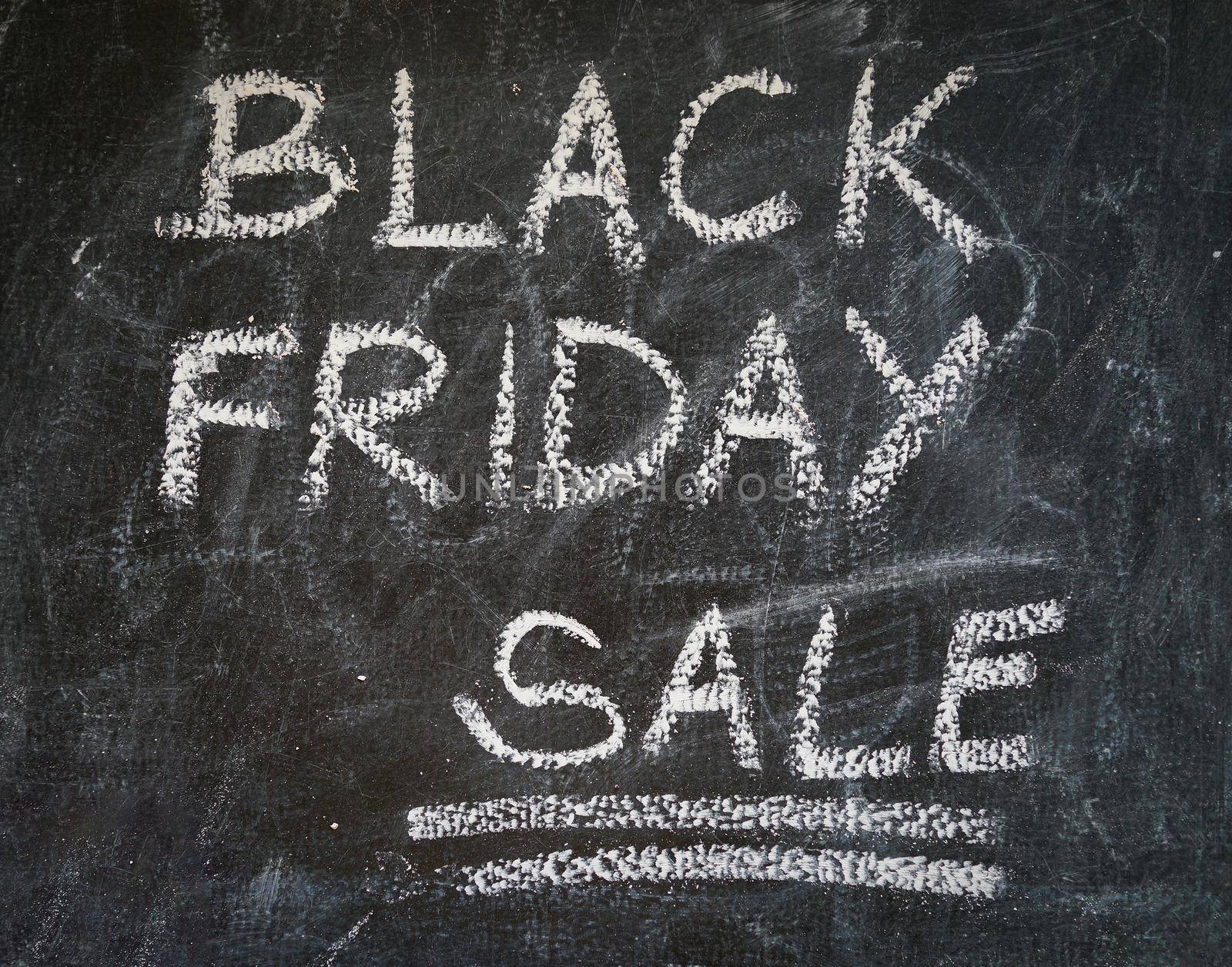 Black friday text on black chalk board