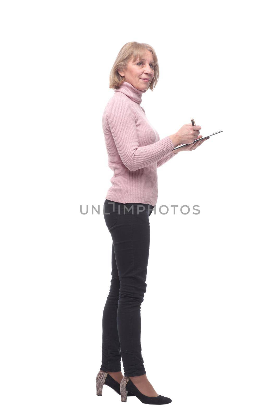 Full length portrait of smiling business woman pointing on blank clipboard by asdf