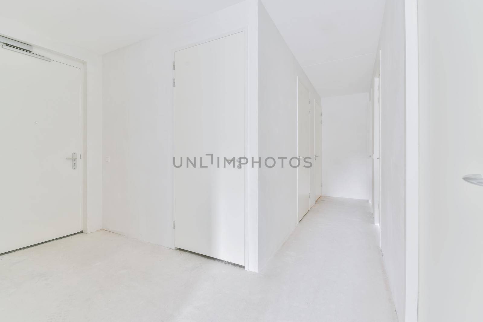 A completely white hallway by casamedia