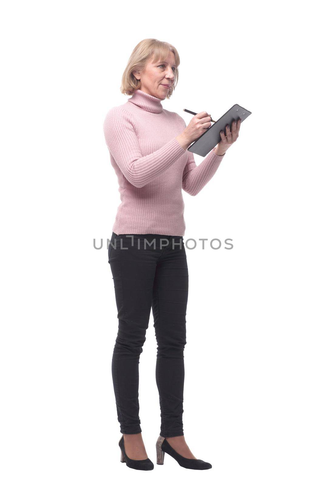Full length portrait of smiling business woman pointing on blank clipboard by asdf
