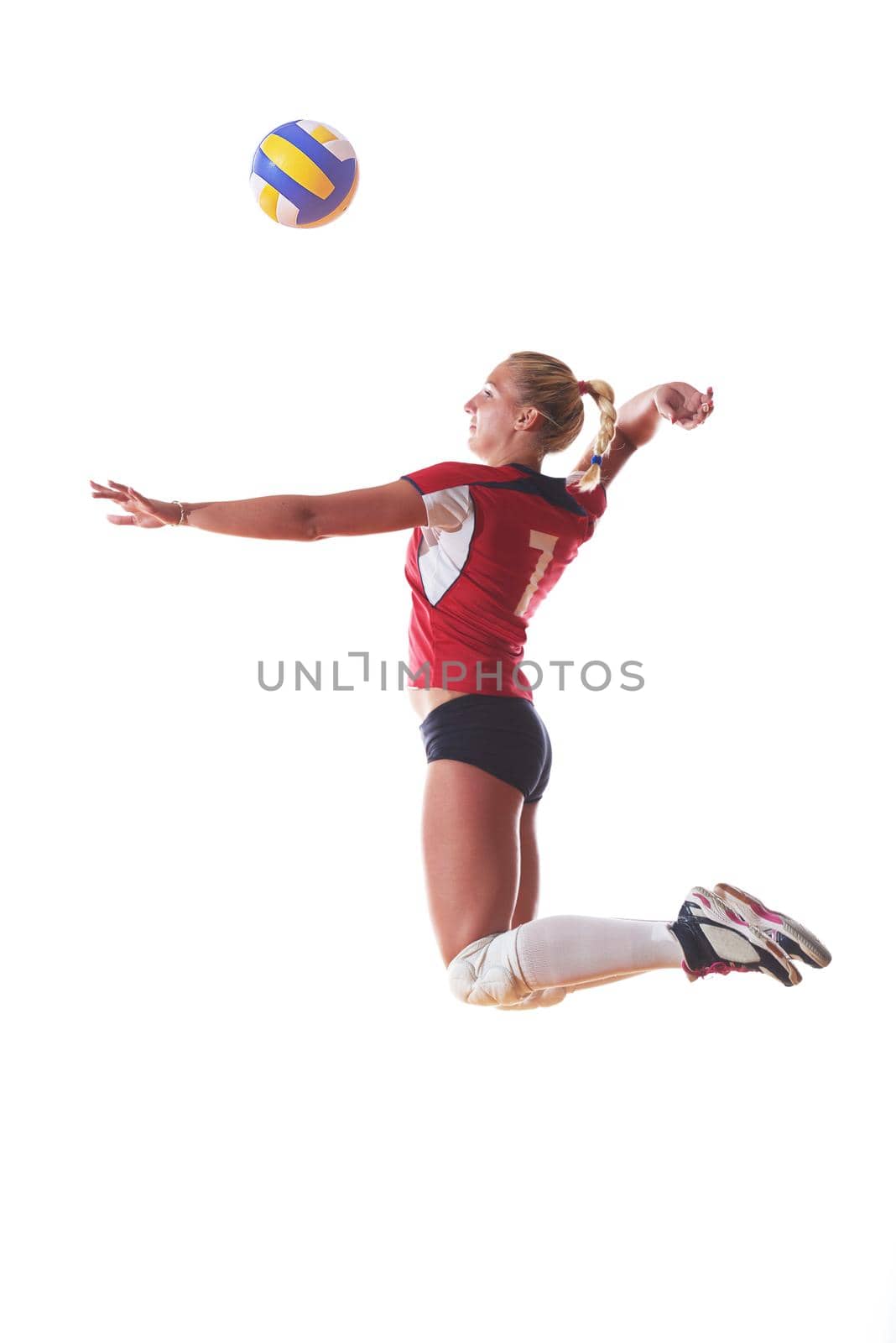 volleyball woman jump and kick ball isolated on white background