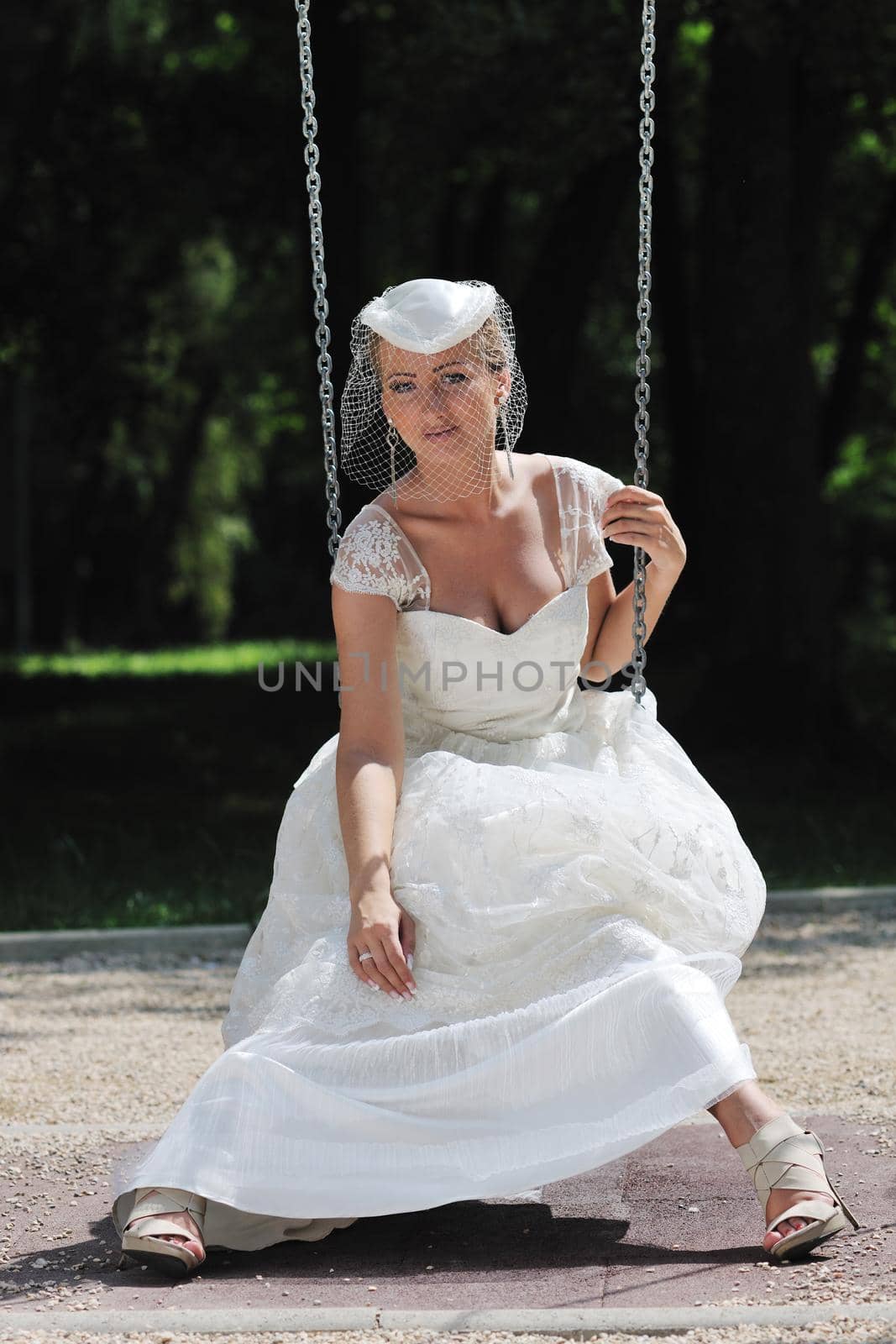 beautiful bride woman people in fashion wedding dress posing outdoor in bright park