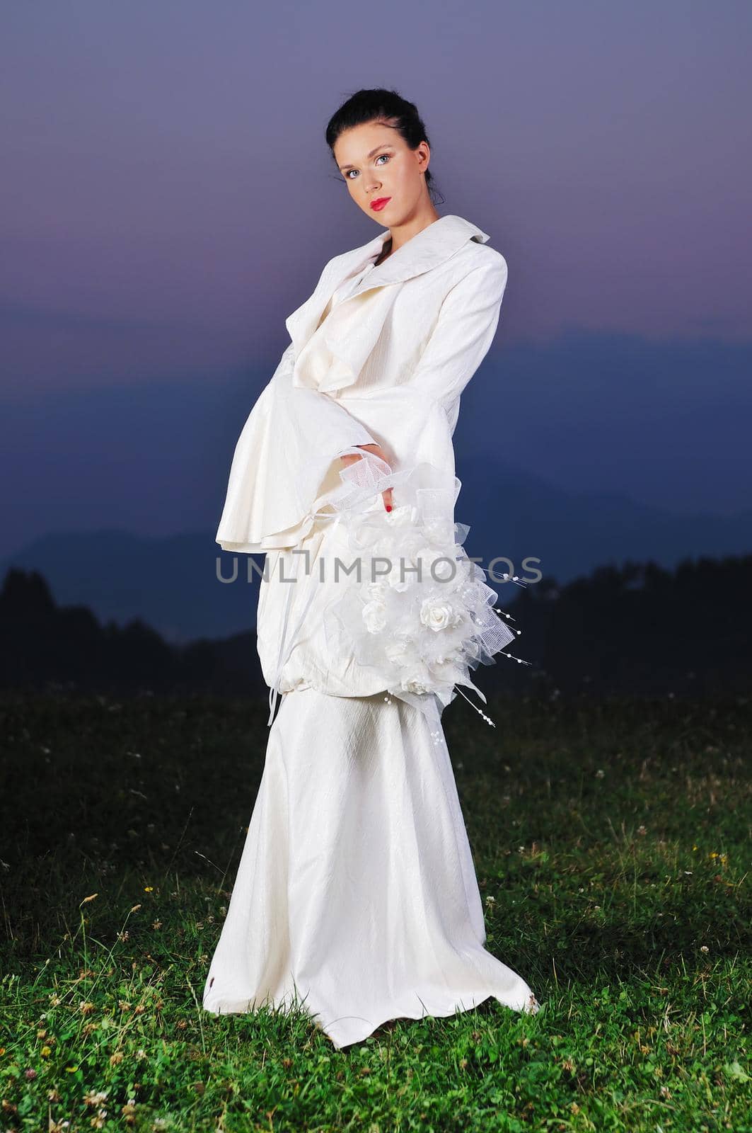 beautiful bride outdoor after wedding ceremny by dotshock