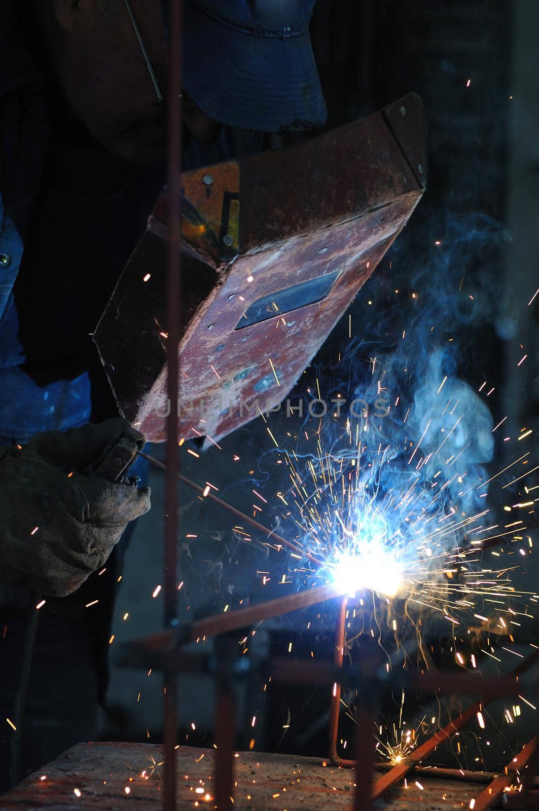 weld machine worker hard industry business