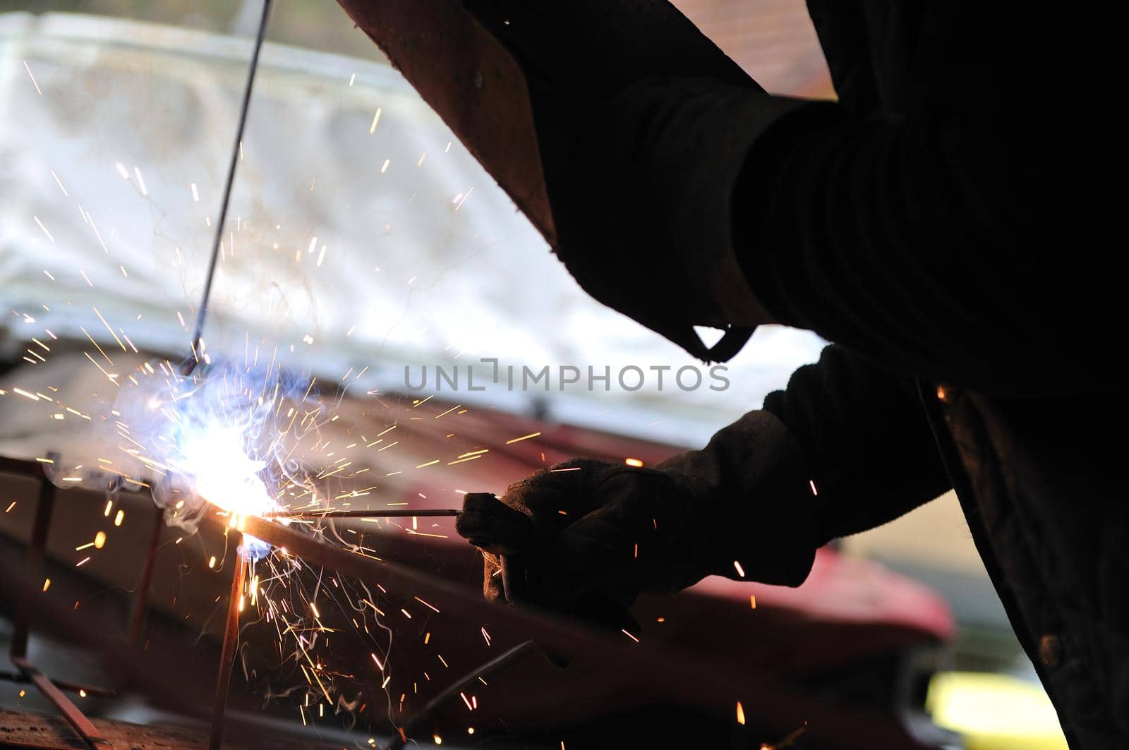 weld machine worker hard industry business