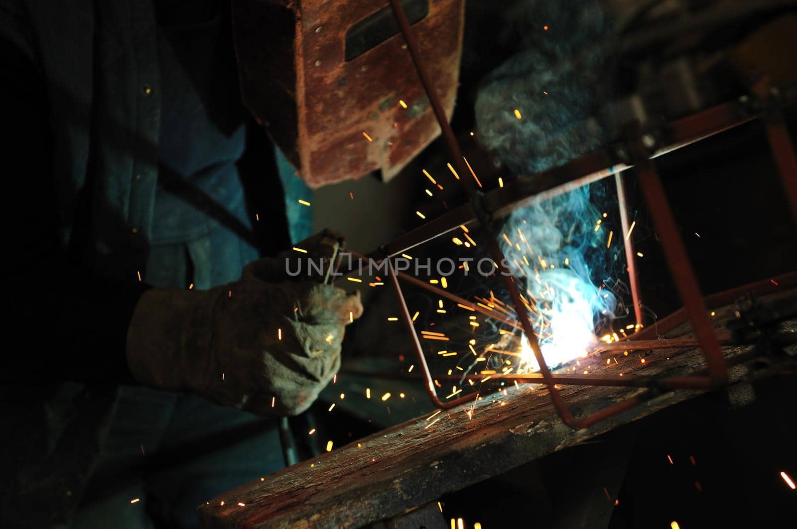 weld machine worker hard industry business