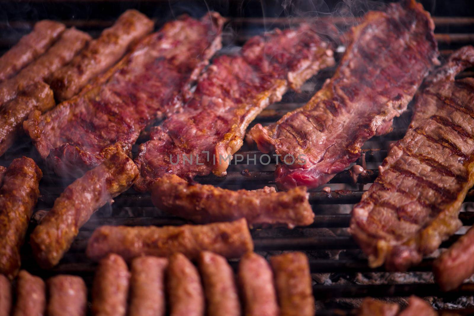 delicious grilled meat on barbecue by dotshock