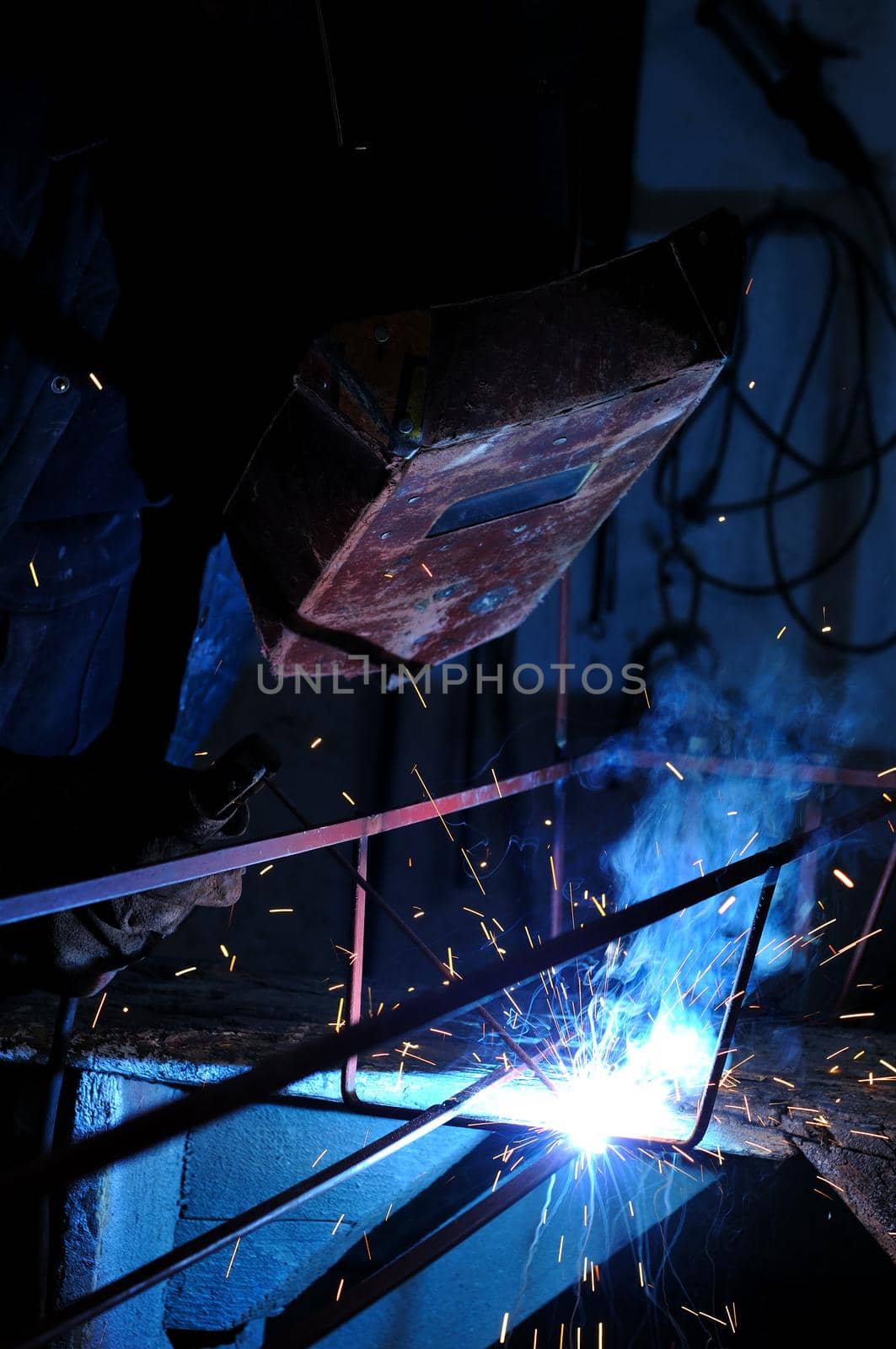 weld machine worker hard industry business