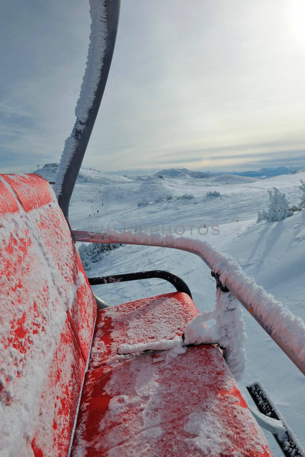 re ski lift chair with beautiful winter landscape in background