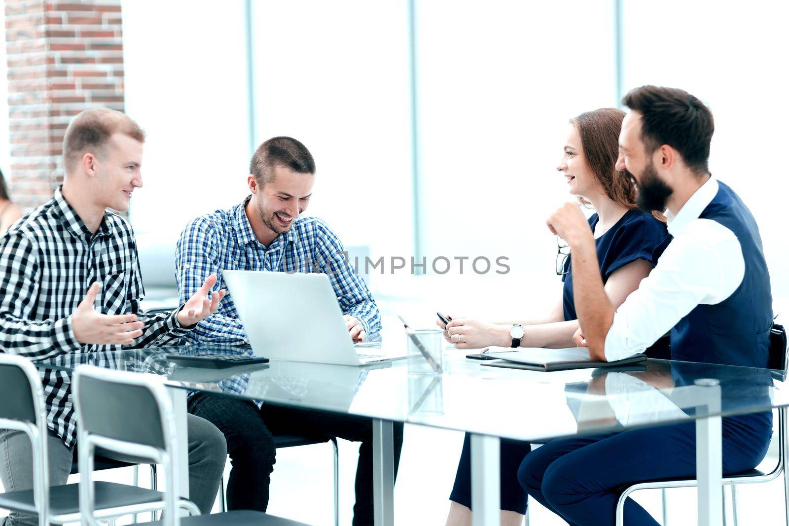 business team is discussing a new business project by SmartPhotoLab