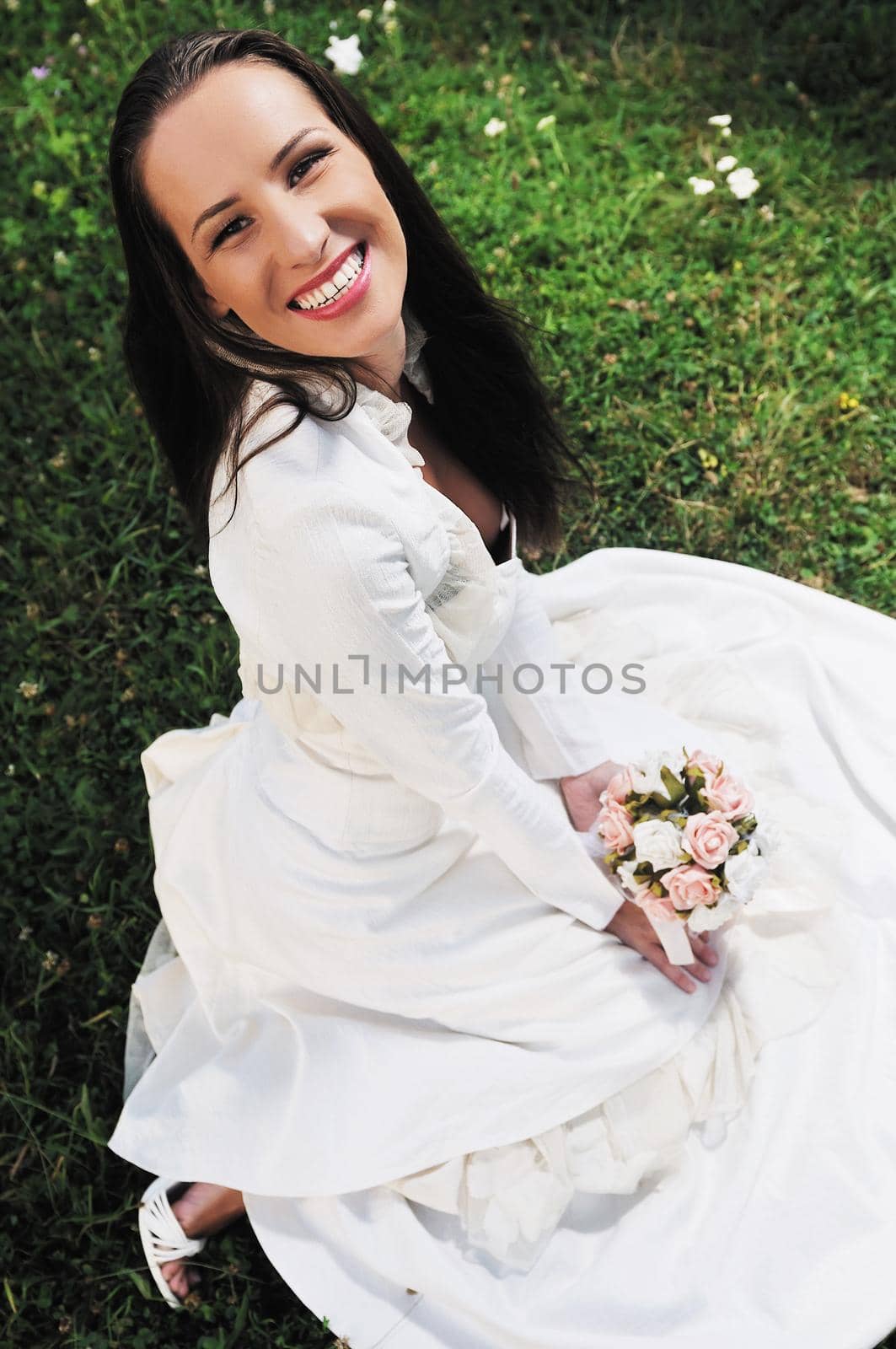 beautiful bride outdoor after wedding ceremny by dotshock