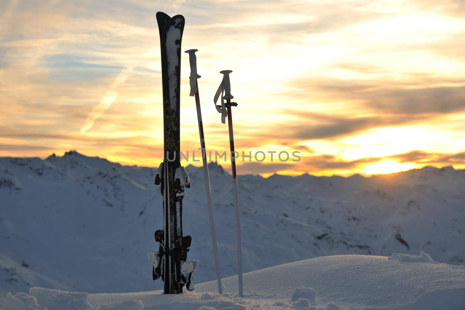 mountain snow ski with beautiful sunset in background