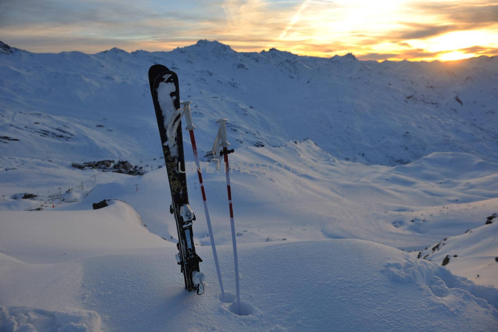 mountain snow ski with beautiful sunset in background