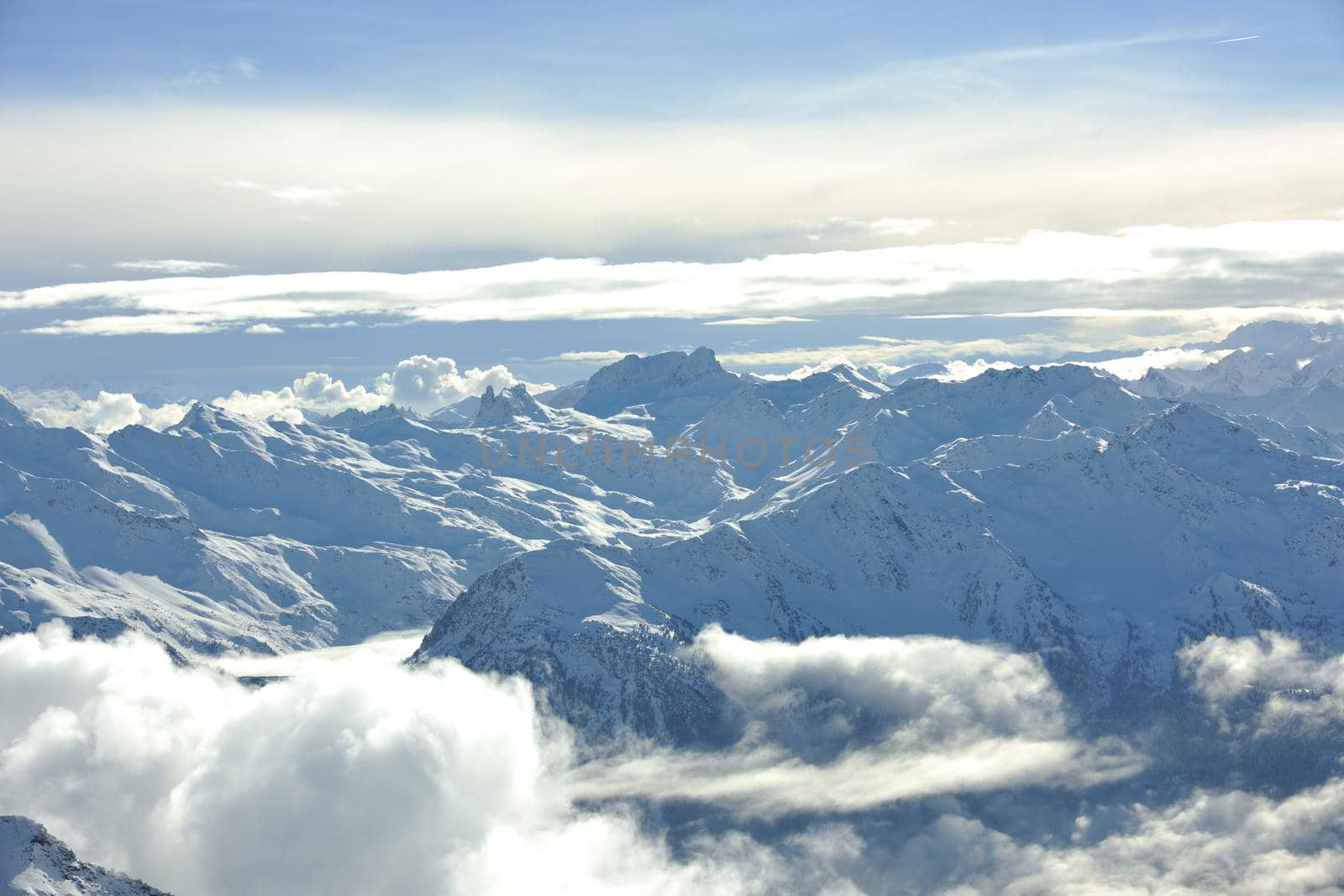 mountain snow fresh sunset at ski resort in france val thorens 