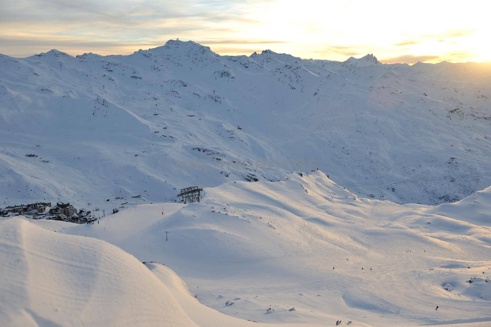 mountain snow fresh sunset at ski resort in france val thorens 