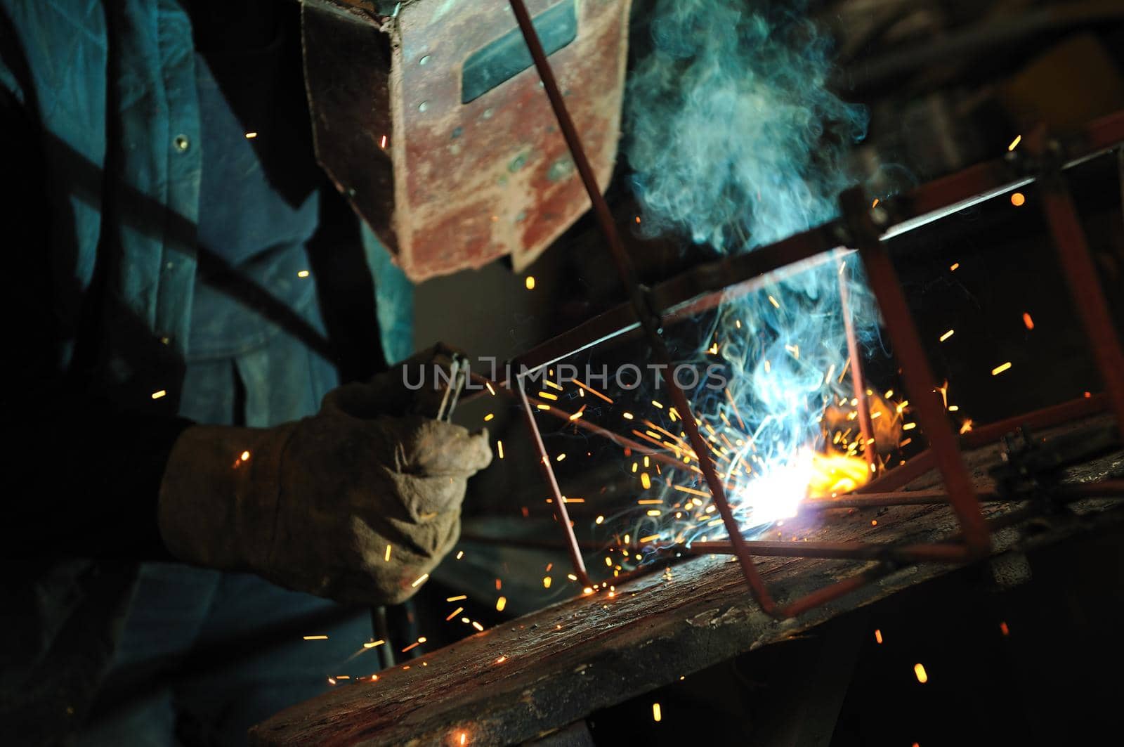 weld machine worker hard industry business