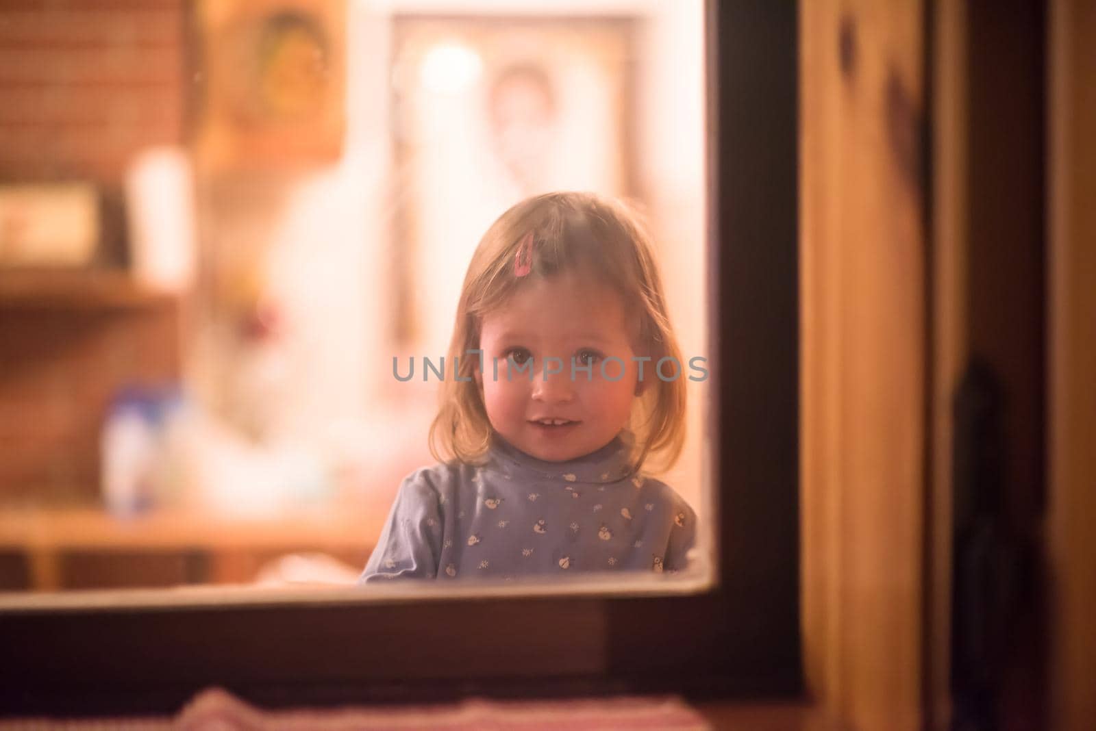 little cute girl playing near the window by dotshock
