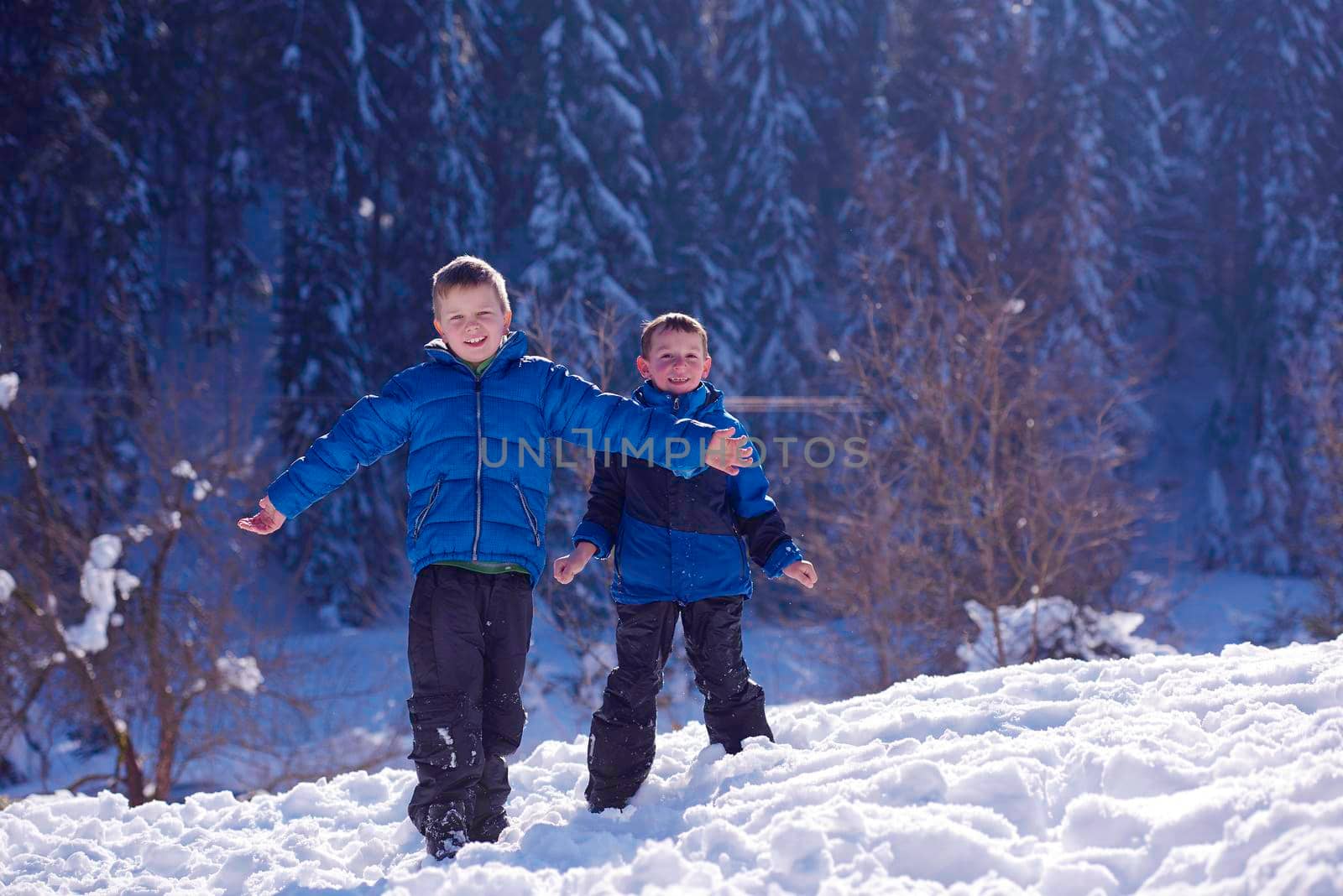kids playing with  fresh snow by dotshock