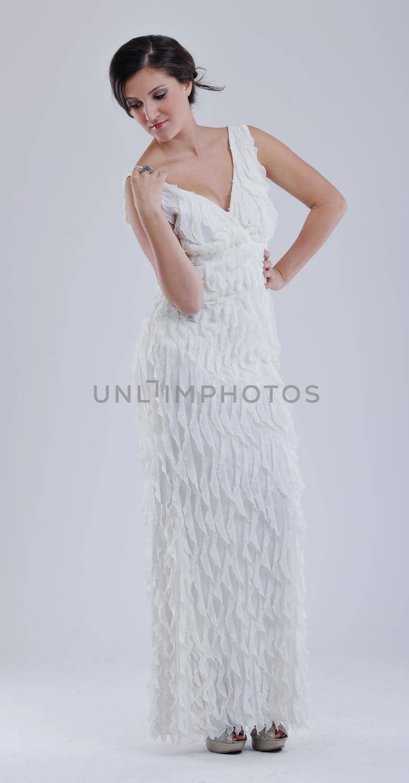 beautiful young bride wearing  wedding dress in retro fashion style isolated on white background in studio