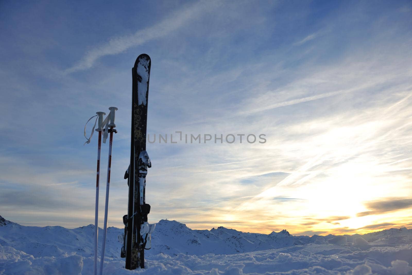 mountain snow ski with beautiful sunset in background