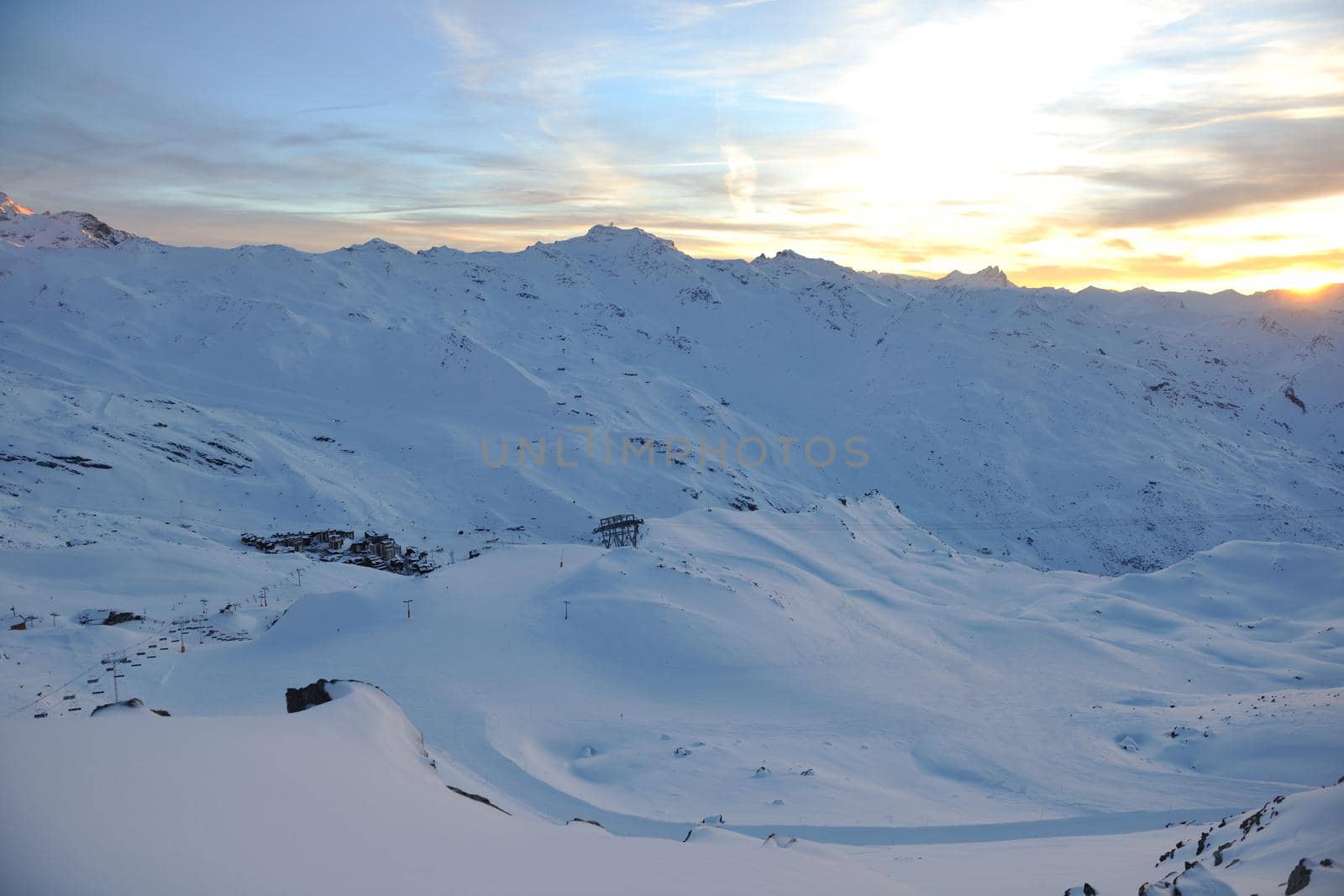 mountain snow fresh sunset at ski resort in france val thorens 