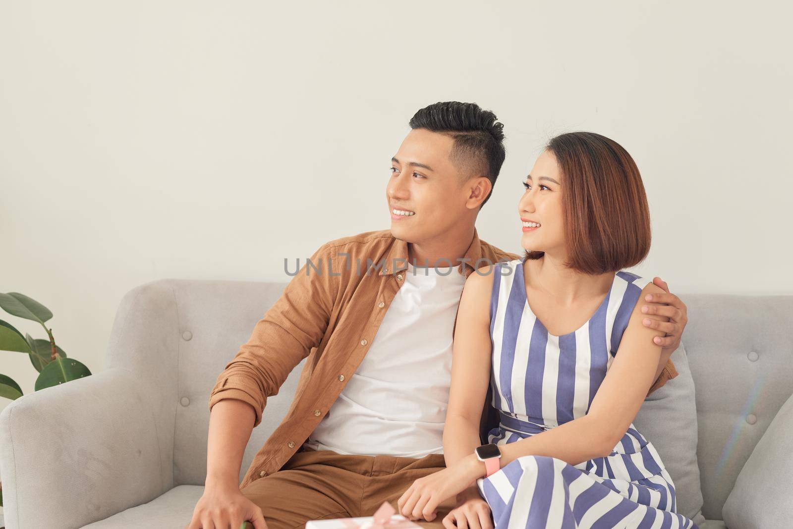 romantic happy young couple relax at modern home indoors