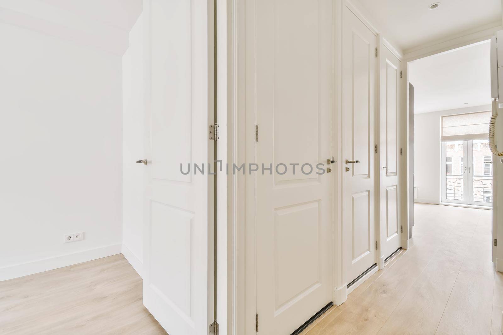 A long empty corridor designed in minimalistic style