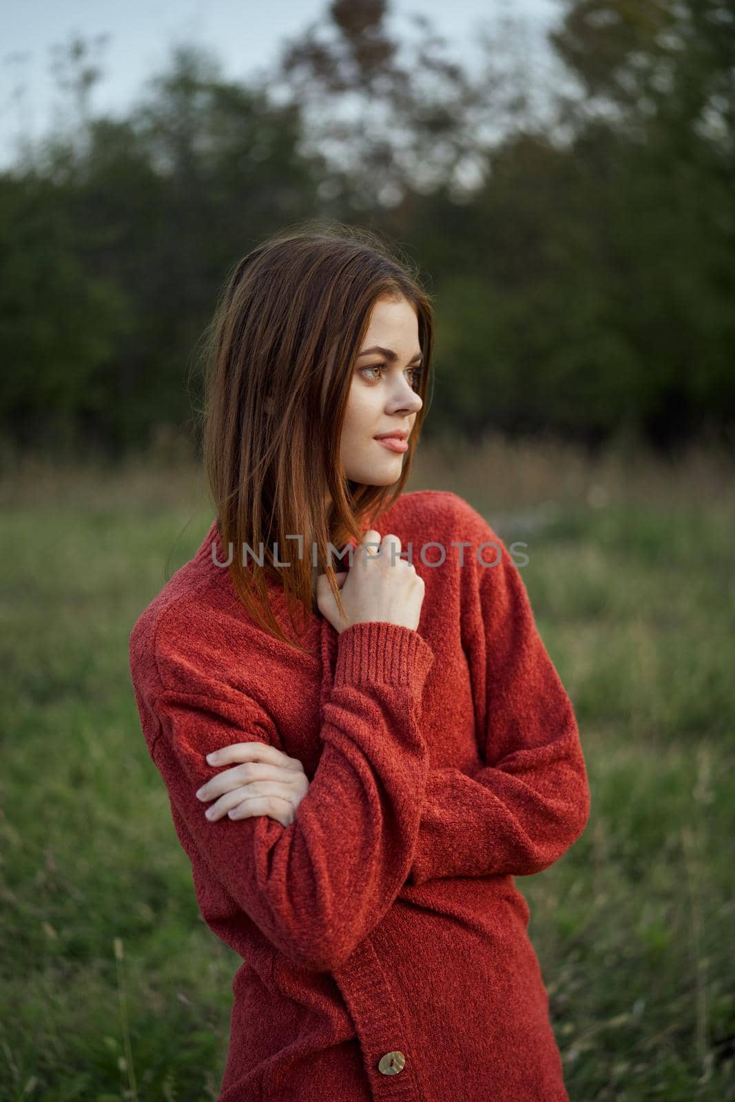 pretty woman in red sweater outdoors walk leisure by Vichizh