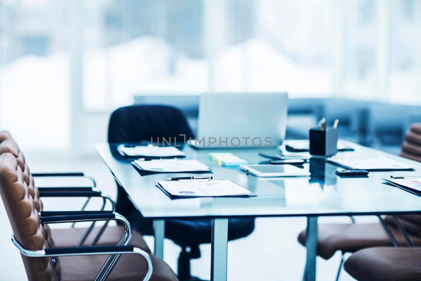 closeup of a Desk with the documents prepared by the beginning of business negotiation.the photo has a empty space for your text