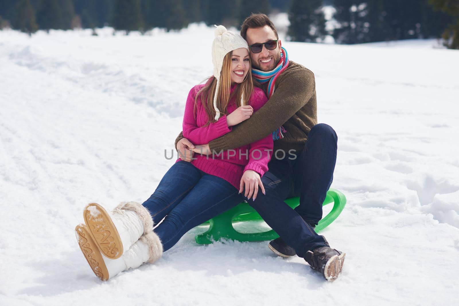 romantic winter  scene, happy young couple having fun on fresh show on winter vacatio, mountain nature landscape