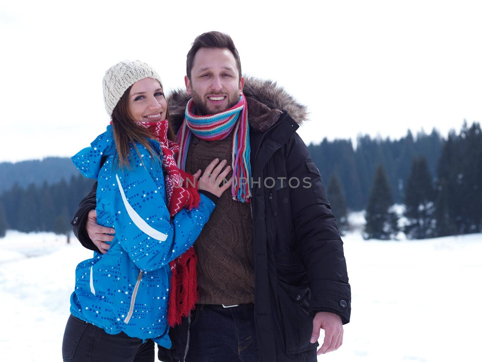 portrait of happy young romantic tourist  couple outdoor in nature at winter vacation