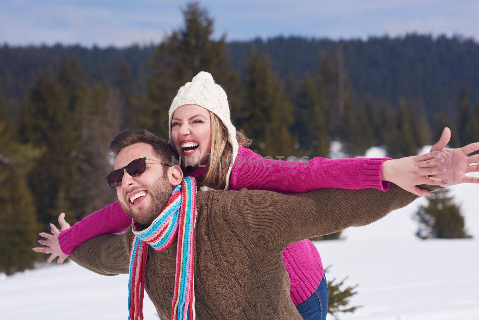 portrait of happy young romantic tourist  couple outdoor in nature at winter vacation