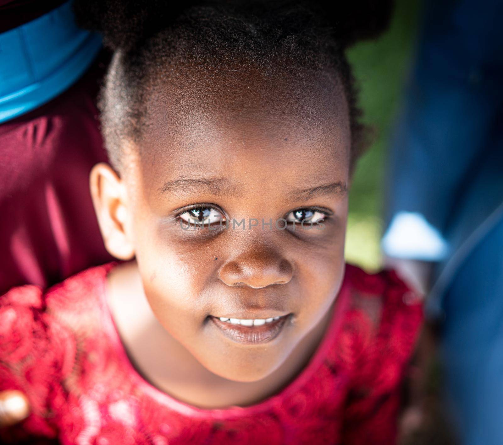 Cute little black African girl close up