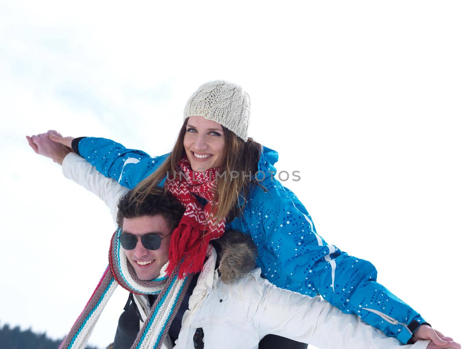 portrait of happy young romantic tourist  couple outdoor in nature at winter vacation