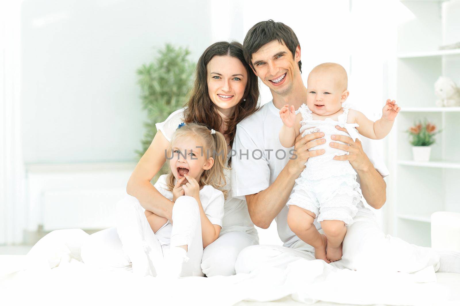 modern happy family on a Sunday in the nursery by SmartPhotoLab