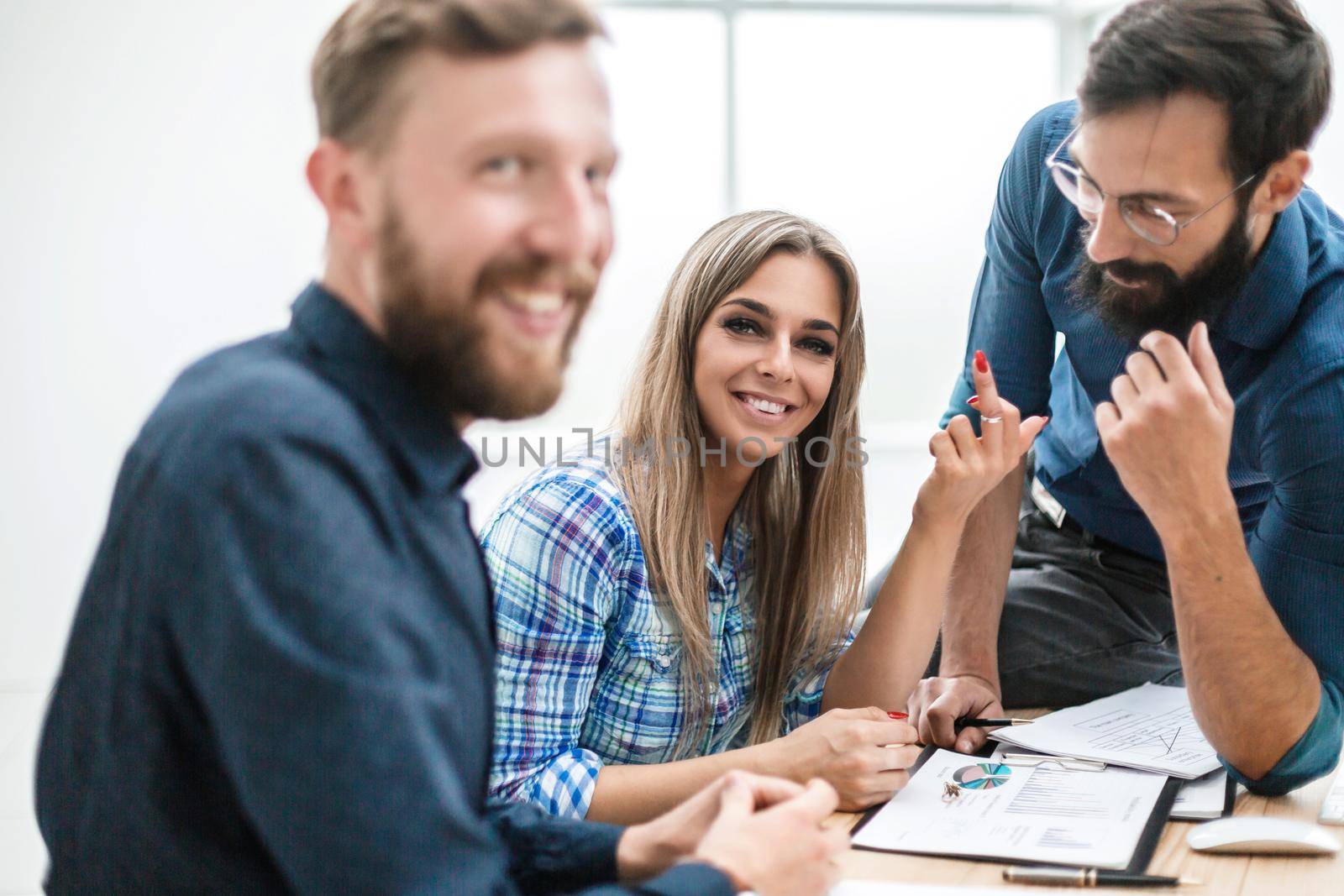 close up. group of business people sitting at their Desk . the concept of teamwork