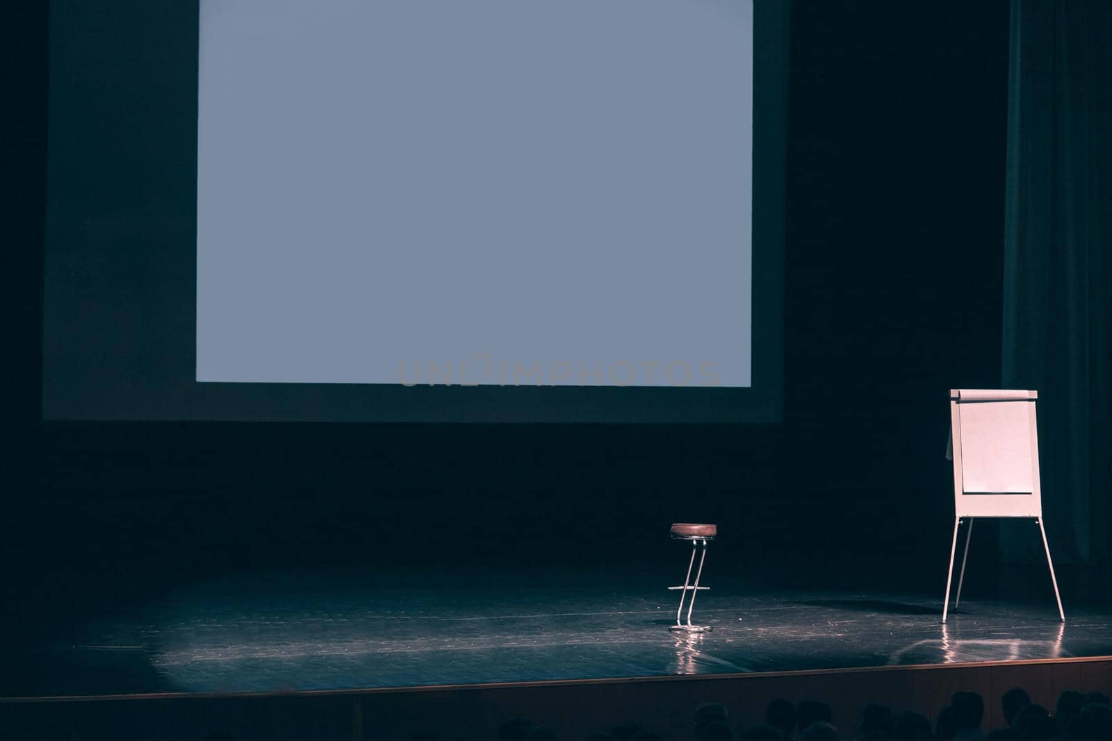 Podium with white screen in the business center . business and education