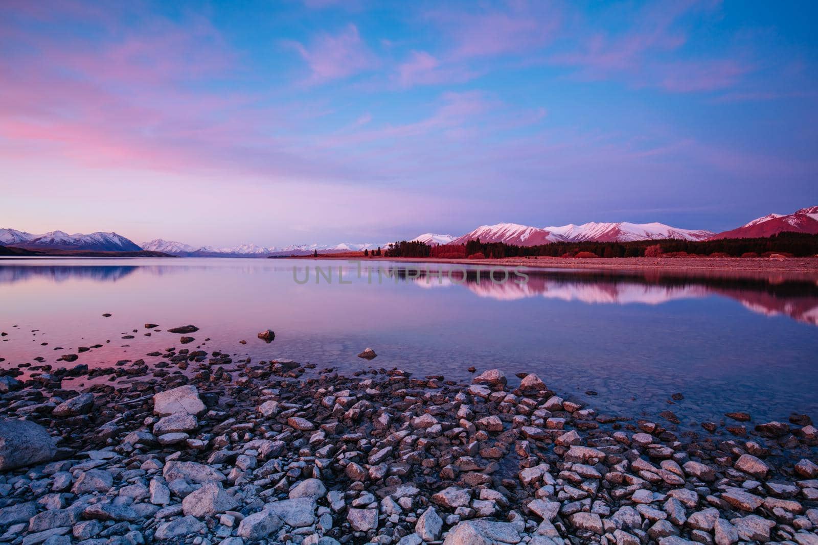 Majestic Lake Tekapo at sunset on a cool spring evening in New Zealand